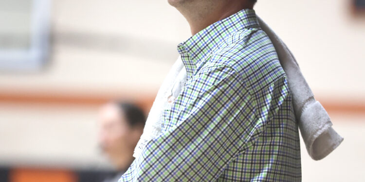 Late scoring spurt pushes Tigers to title game win