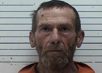 Dodgy dump truck, pursuit leads to arrest at gunpoint