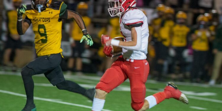 Booth has big outing in Mac opener