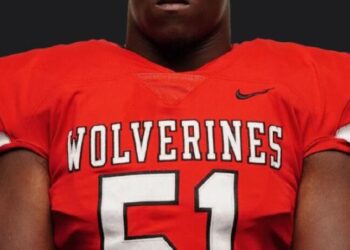 LHS defender works hard to play football