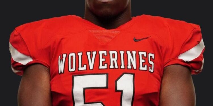 LHS defender works hard to play football