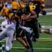 Onside kick recoveries ignite Mac victory