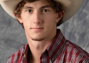 Young tending to his business