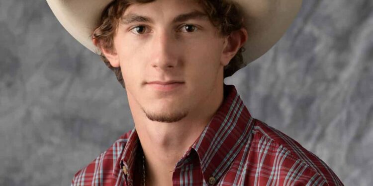 Young tending to his business