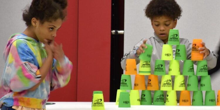 Students cup stack to confidence, world record in Lawton