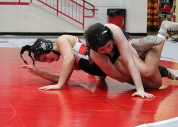 Cache girls, boys sweep mat dual from Elgin