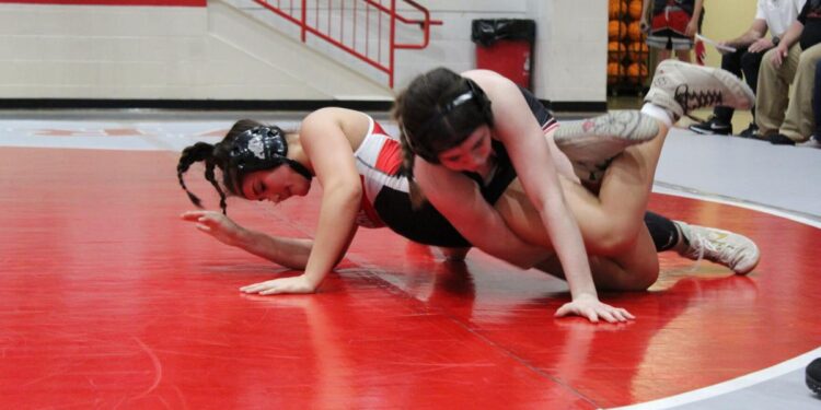 Cache girls, boys sweep mat dual from Elgin