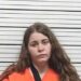 Shot woman jailed for stabbing allegations in Caddo County
