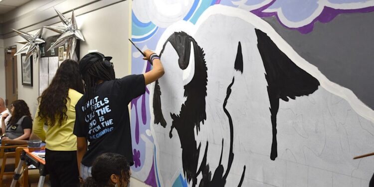 Lawton brothers share heart for art with SCORE Academy students