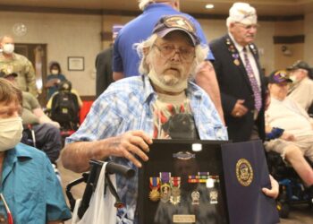 Vietnam War Veteran receives Purple Heart and service medals decades after retirement from service