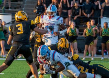 Harris, Mac rout Ike, 57-20