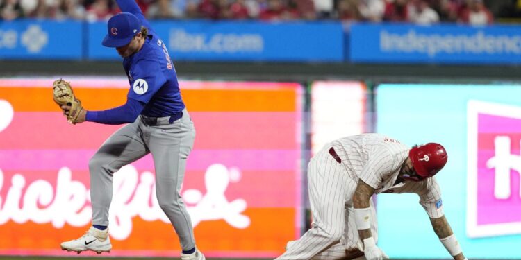 Phillies top Cubs, 6-2, clinch 1st NL East title since 2011