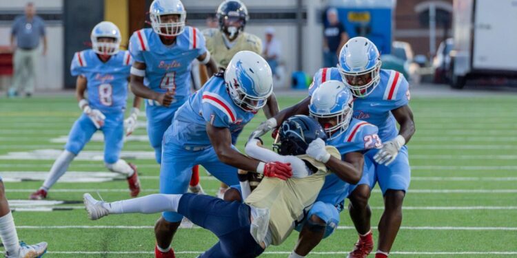 Eagles edge Jaguars in district battle