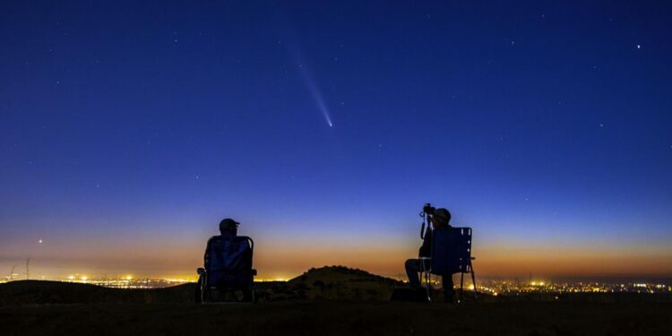 October's supermoon pairs with a comet for a special nighttime spectacle