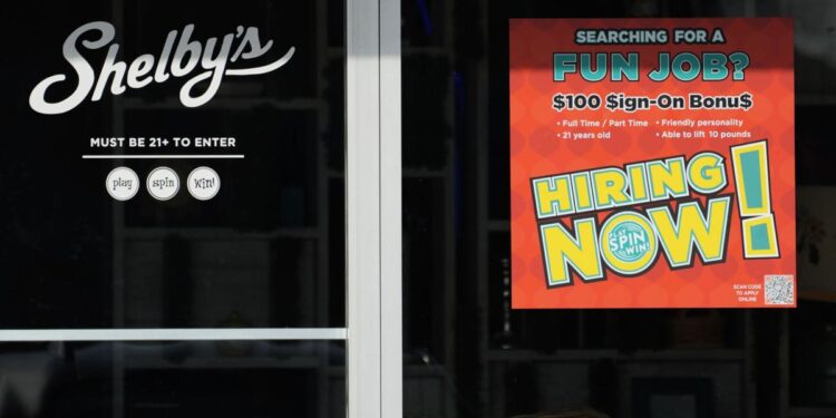 Fewer Americans apply for jobless benefits last week as labor market shows continued strength