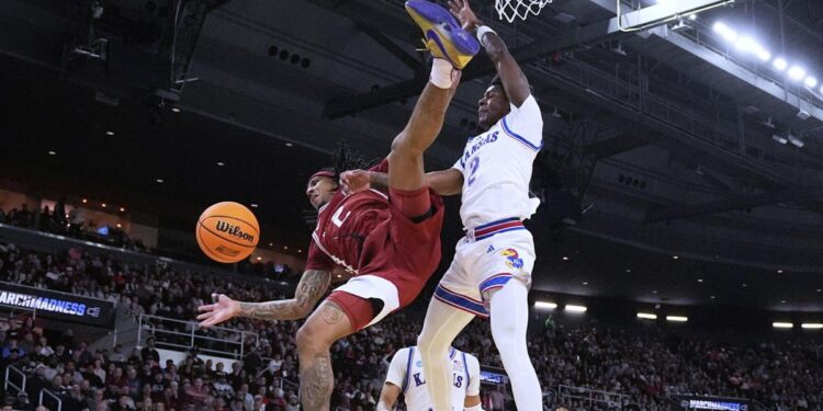 Arkansas bounces Kansas out, 79-72