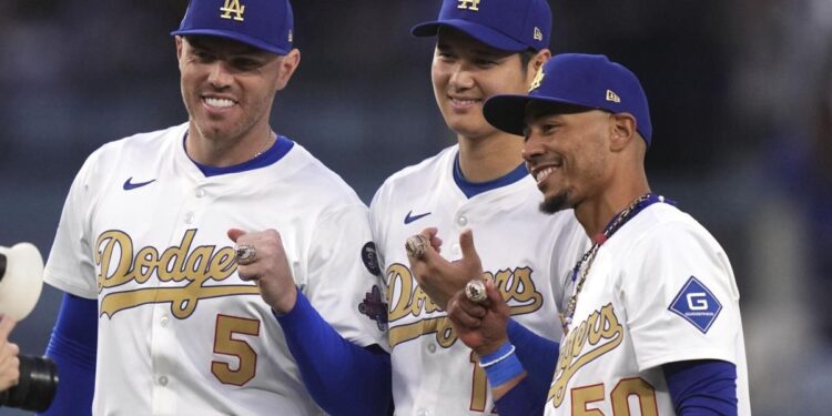 Dodgers show off glittering World Series rings