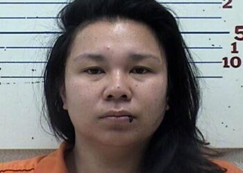 Lawton woman bound over for trial for role in partner's child abuse